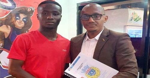 Morlaye et le représentant de spots consultant en Guinée