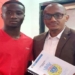 Morlaye et le représentant de spots consultant en Guinée