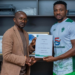 L'attaquant nigérian Ayinla Abayomi lors de son officialisation avec le Hafia FC après son transfert en provenance du FC Loto Popo.