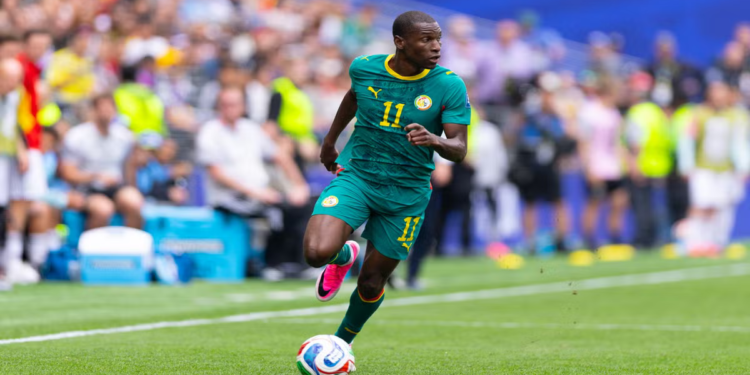 Les joueurs du Sénégal célèbrent leur match nul face au Mozambique.