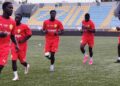 Le sélectionneur Mohamed Lamine Sylla et le capitaine Ibrahima Tawel N’Diaye avant la finale de l’UFOA-A U20 entre la Guinée et la Gambie.
